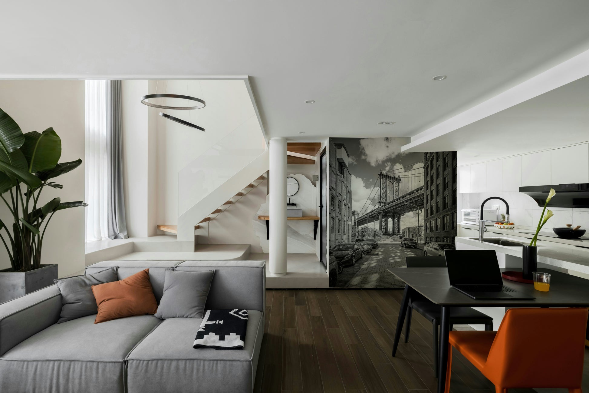 Architectural mural of Manhattan Bridge from street level.

