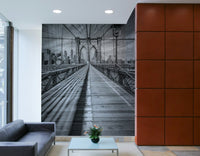 Cityscape wall mural highlighting the structure of Brooklyn Bridge.

