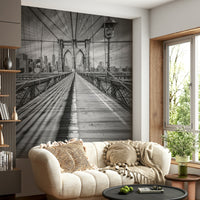 Wall mural of the Brooklyn Bridge with NYC skyline in view.

