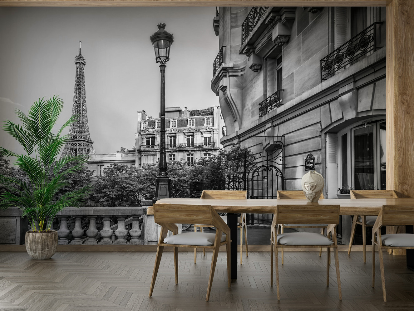 Monochrome mural of Paris street scene with Eiffel Tower.

