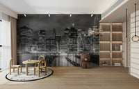 Monochrome wall mural of New York City skyline at night.

