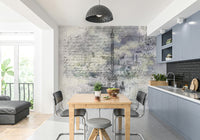 Paris rooftops and skyline seen from above in mural format.

