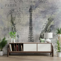 Collage mural featuring Eiffel Tower and classic Paris street life.

