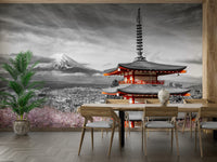 Mount Fuji mural with soft pink blossoms and traditional temple view.

