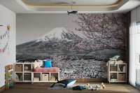 Mount Fuji mural with soft pink blossoms and traditional temple view.

