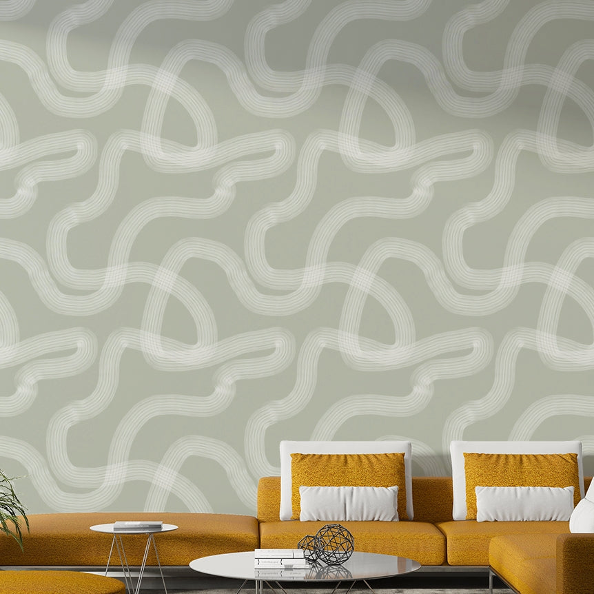 Neutral-toned wallpaper featuring soft raked wave patterns.

