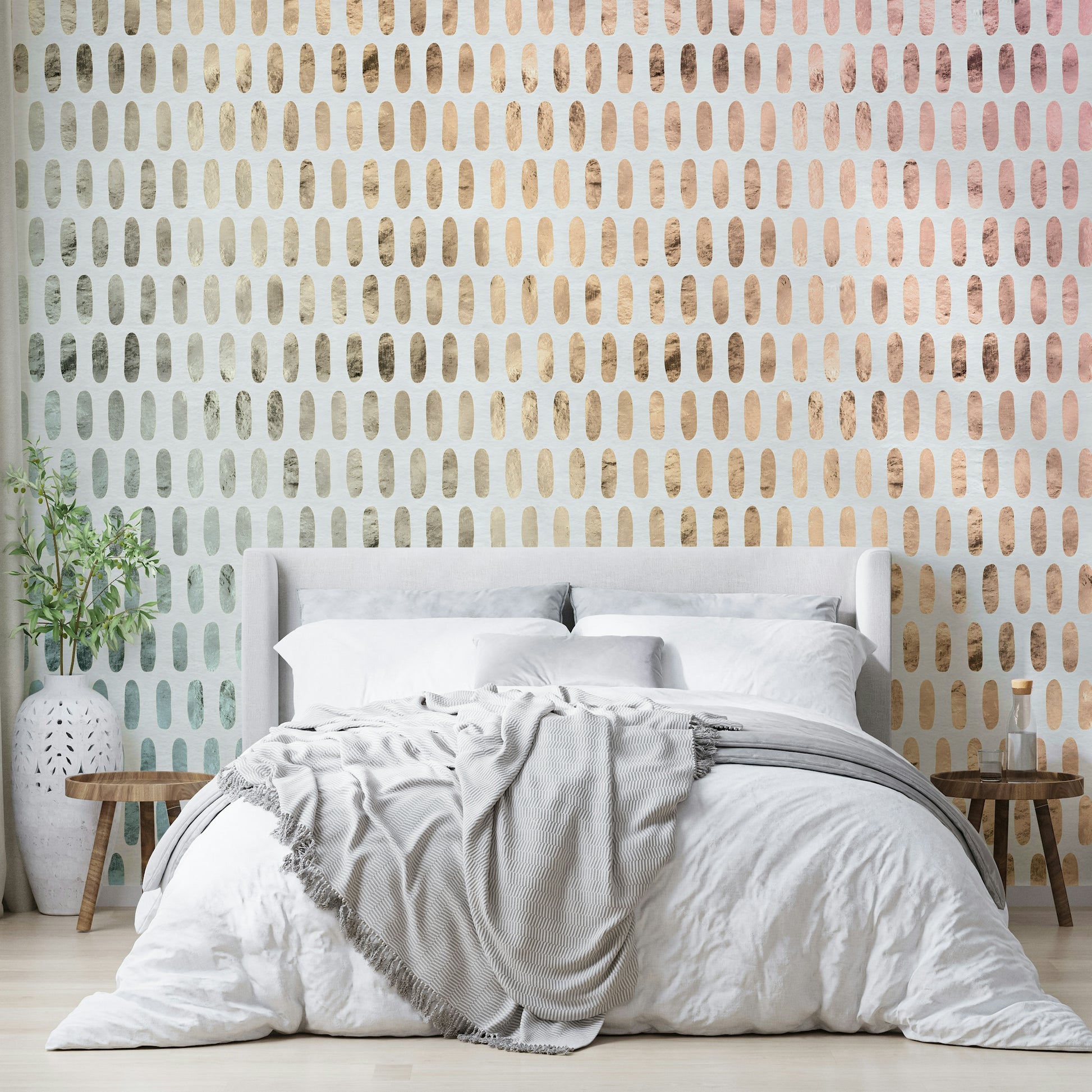Modern soft white wall design with iridescent ovals.

