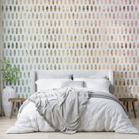 Modern soft white wall design with iridescent ovals.

