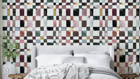 Hand-painted checkered wall mural in soft tones

