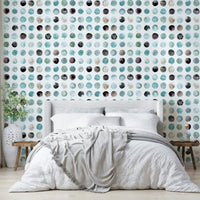 Aqua watercolor dots on a white minimalist wallpaper.

