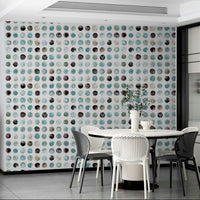 Soft blue watercolor dots in a Scandinavian wallpaper style.

