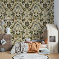 Whimsical moth wallpaper in gold and green garden tones.

