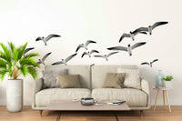 Horizontal mural featuring birds in mid-flight

