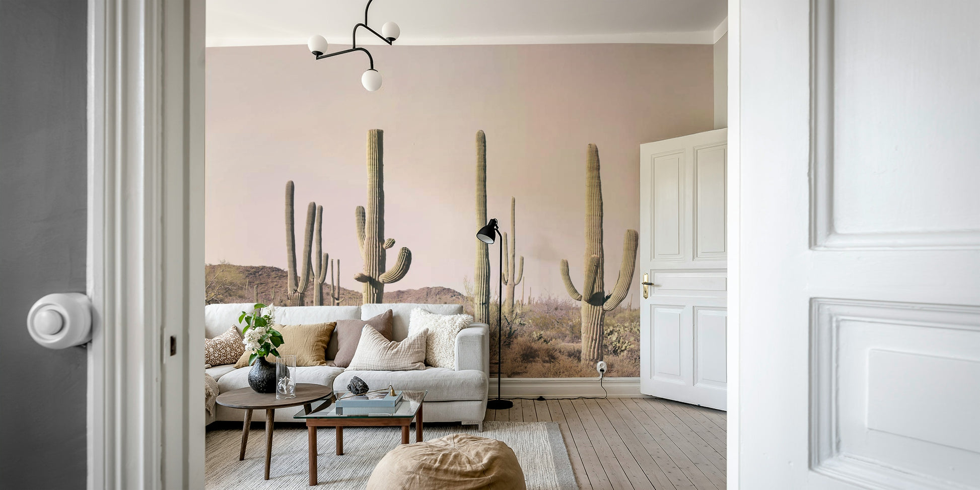 Wide-view cactus mural with gentle desert blush palette

