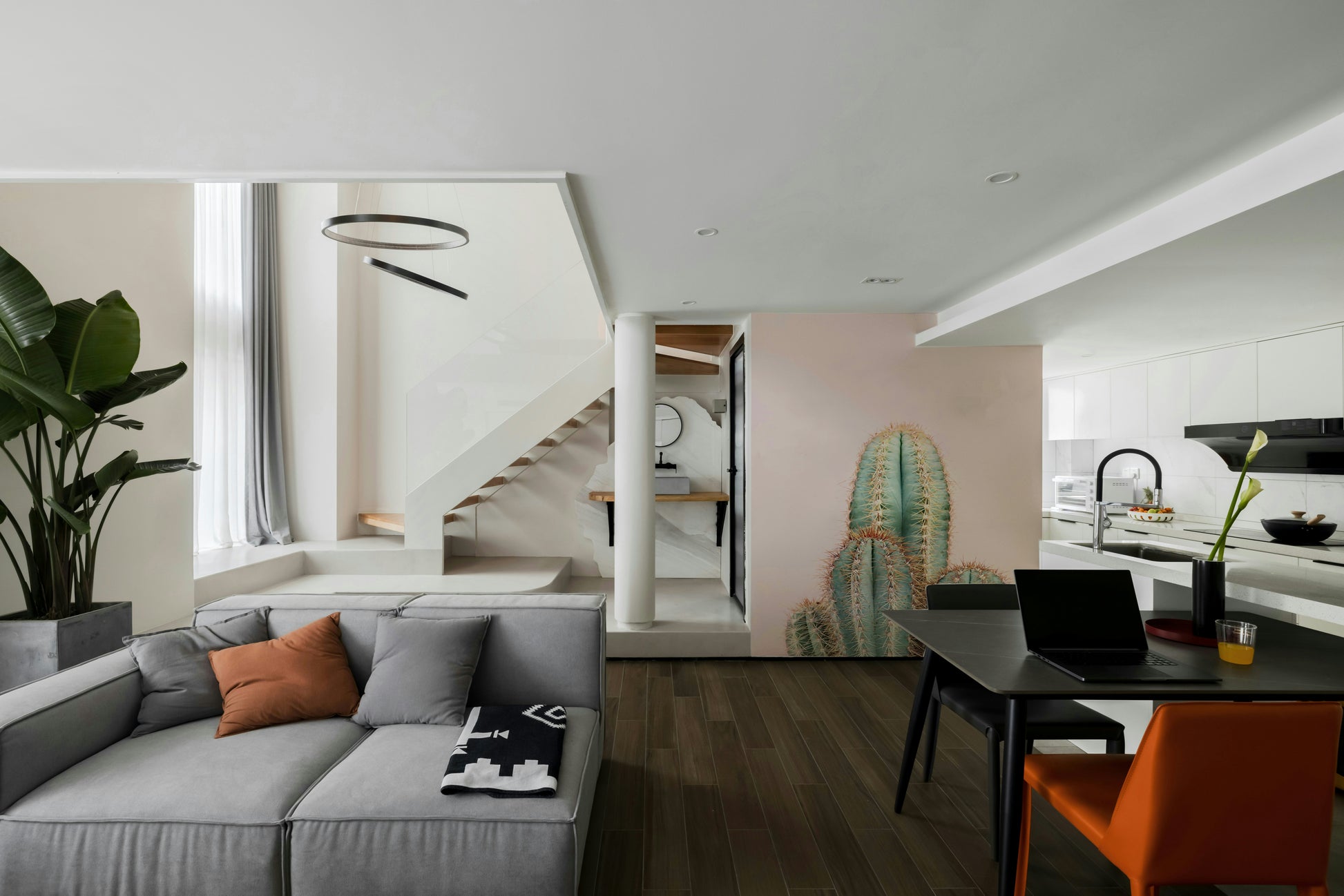 Soft desert scene featuring cacti in pink tones

