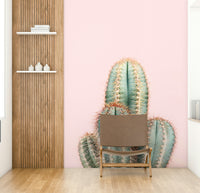 Serene cactus wall mural with pink and green accents

