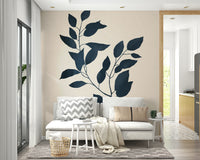 Silhouette design of plants in neutral tones on the wall.

