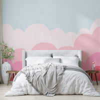 Dreamy pastel pink sunrise mural for calming vibes.

