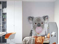 Fun koala wall mural with bubble gum for a cheerful space.

