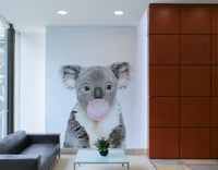 Cartoon bubble gum koala wall art for kids' bedroom.

