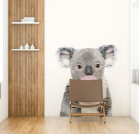 Cute bubble gum koala mural for kids' room decor.


