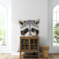 Fun raccoon mural blowing bubble gum in playful design.

