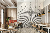 Minimalist black sun rays mural with golden accents

