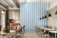Trendy striped wallpaper with skyline detail.

