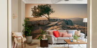 Serene dusk scene with a single tree wall mural.

