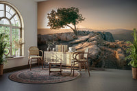 Tranquil dusk-themed wall mural with a lone tree.

