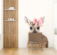 Serene deer with bow wall mural for a calming space

