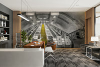 Perspective escalator mural with tunnel light

