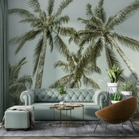 Botanical palm trees on textured wall backdrop

