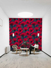 Dark blue wall with striking red poppy flower print

