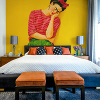 Soft glowing mural with golden light and abstract shapes

