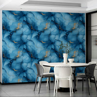 Bathroom with soft blue flowing mural-style wallpaper

