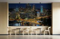 Evening Pittsburgh skyline mural with glowing bridges

