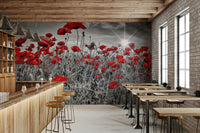 Wall mural of red poppies in sunny field

