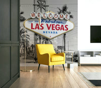 Red and blue Las Vegas sign with grayscale background

