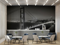 City lights faintly glowing under bridge in mural design

