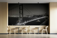 Urban wall wallpaper showing bridge silhouette at night

