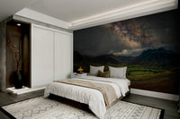 Wall mural showing stars and misty mountains

