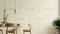 Delicate dragonflies on patterned backdrop
