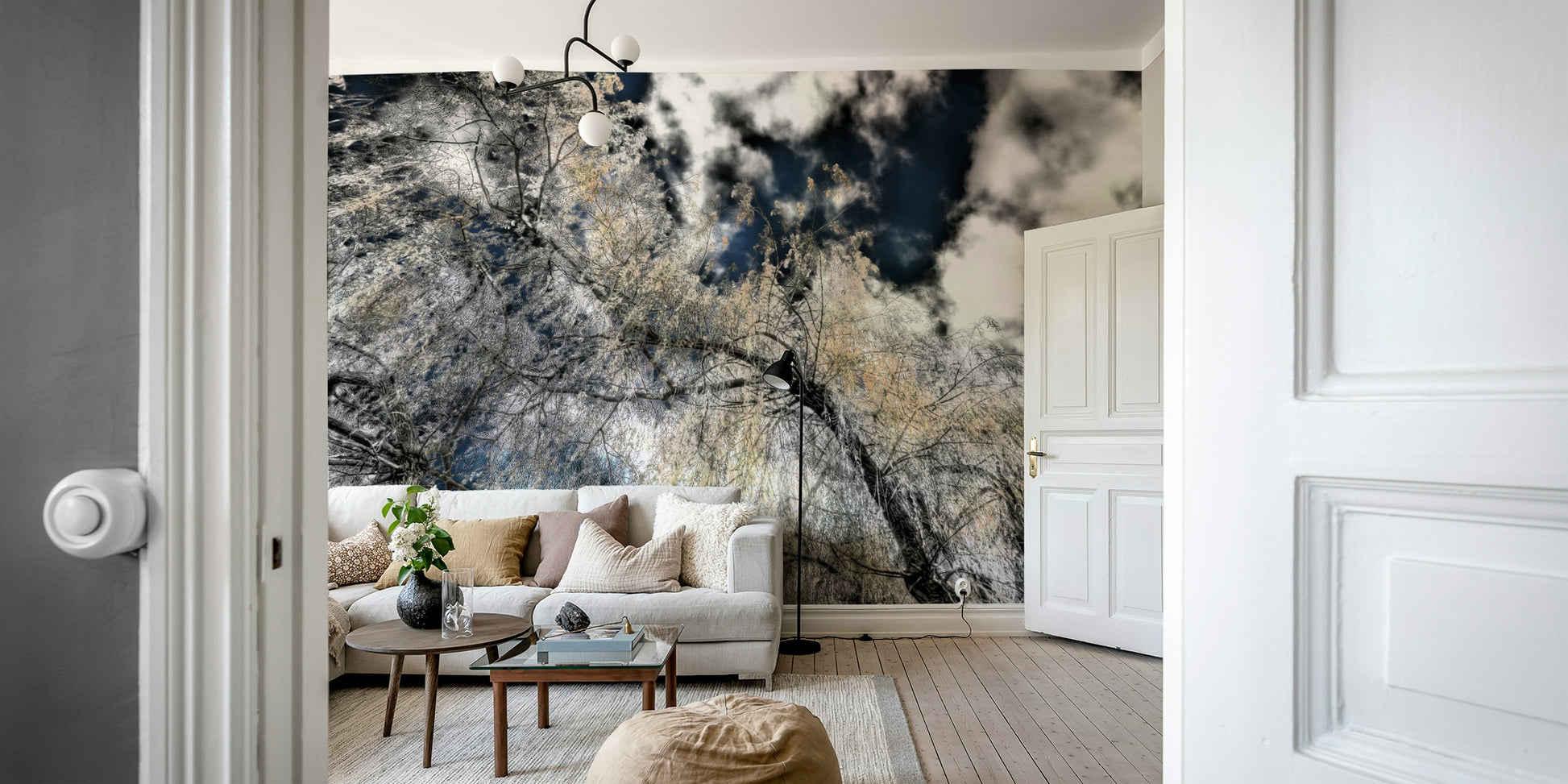 The wall mural is installed on a living room feature wall.

