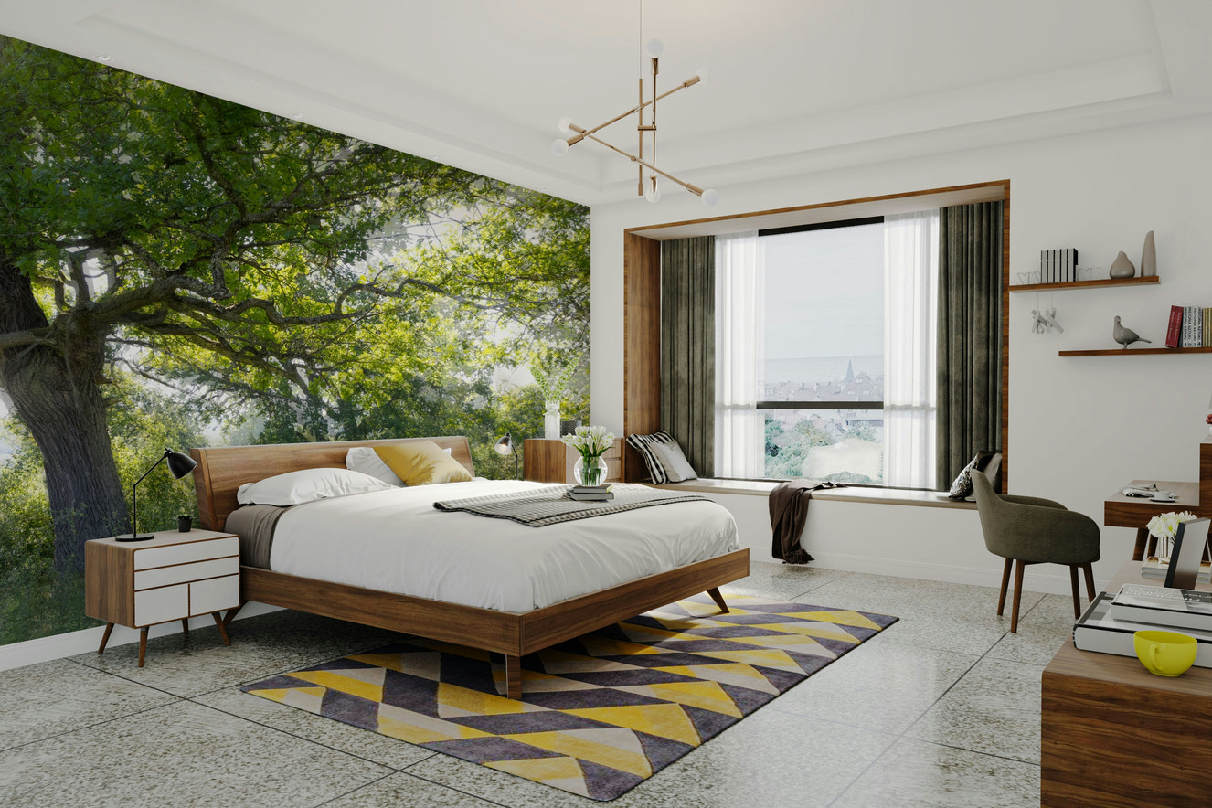 A photo-realistic wall mural of a serene green tree in a landscape.

