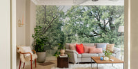 The wall mural is installed on a living room feature wall.


