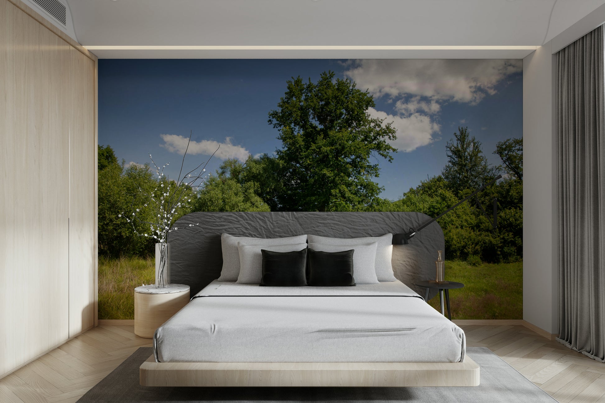 The background is a clear, peaceful blue sky with a few soft clouds.

