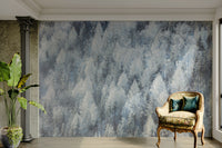 Soft focus of snowy pines.

