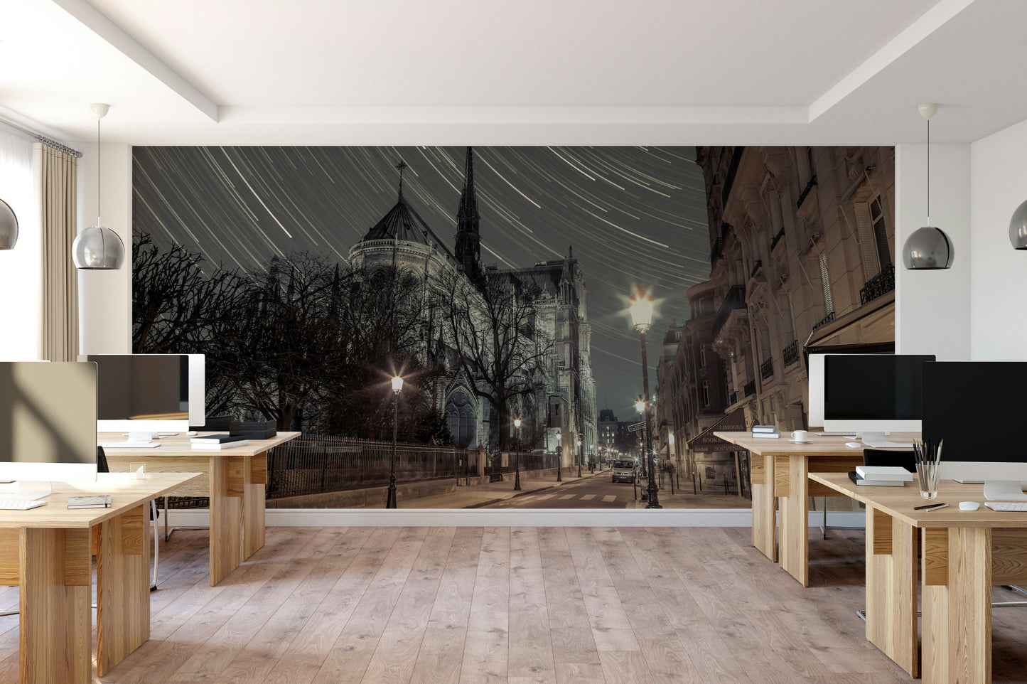 Star trails over Parisian monument.

