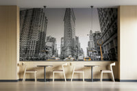 Unique triangular building in focus.

